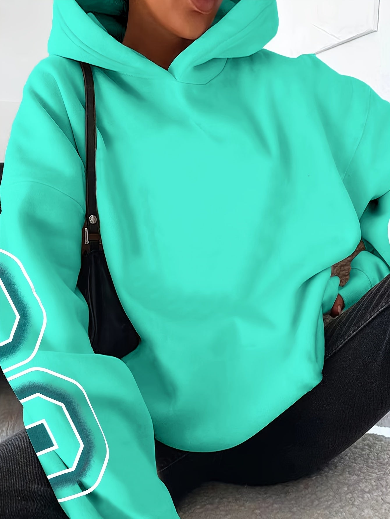 Miscozy's unisex Letter Print Drop Shoulder Hoodie